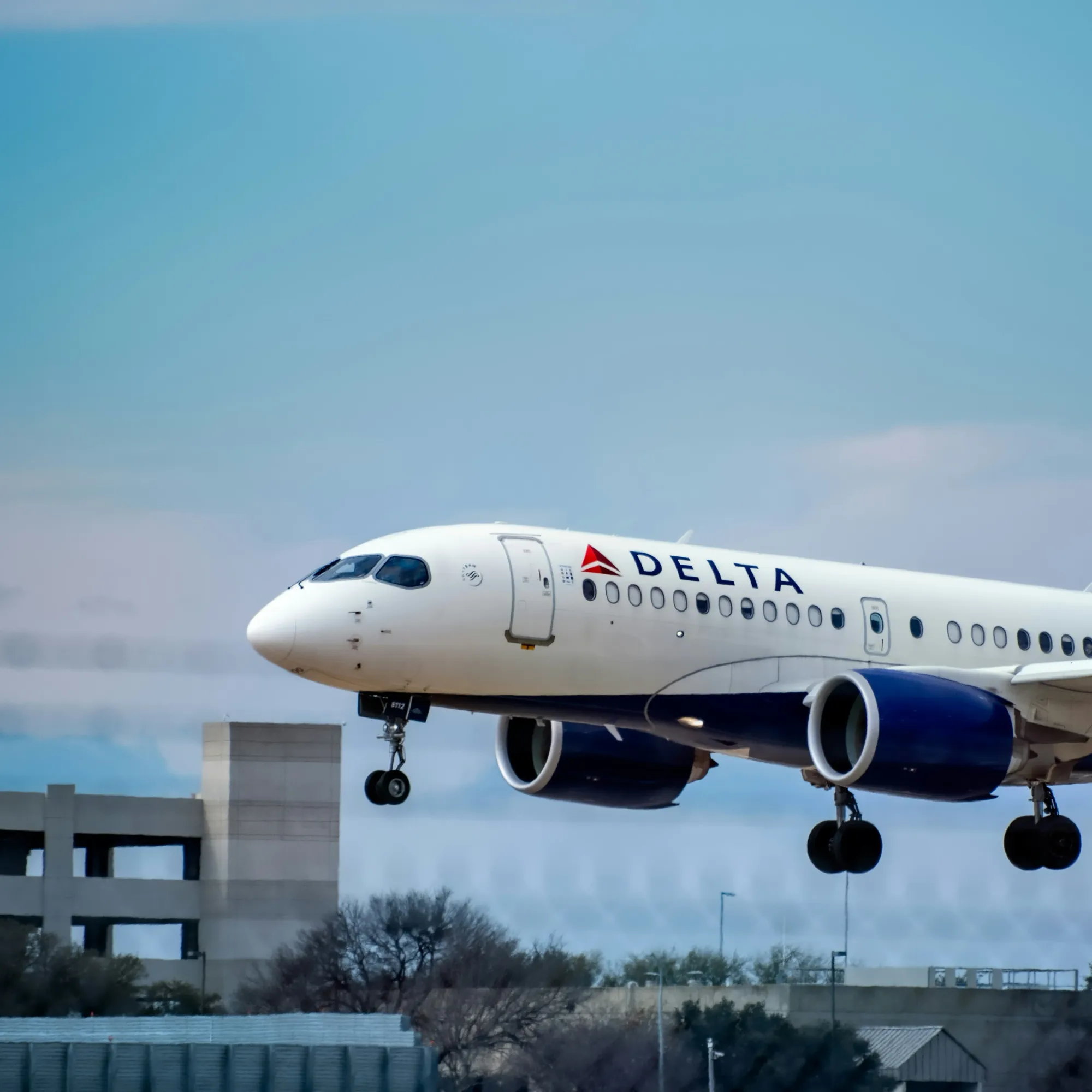 A Delta airplane prepares to land.