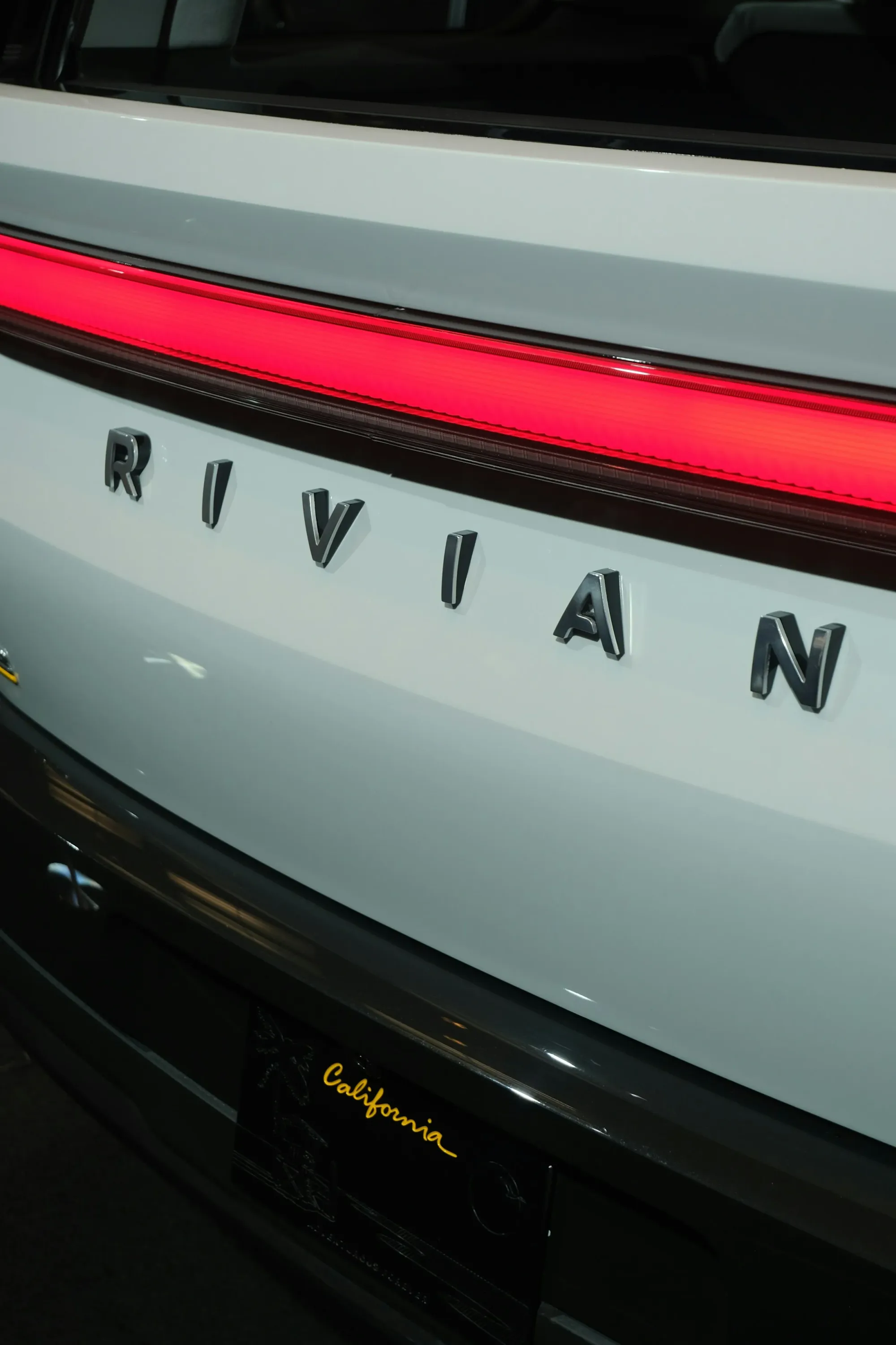 Rivian Shares Jump After Earnings Beat and Raised Outlook as R2 Takes Lead